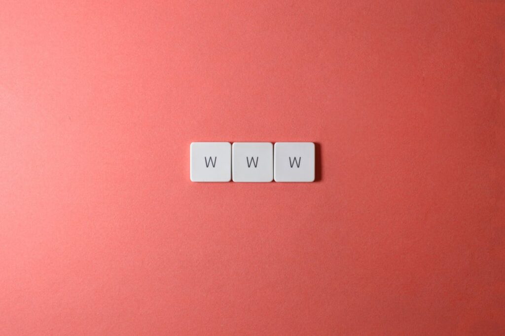 creat a website for startups by choosing a good domain. A picture of 3 scrabble letters that are w making up www.