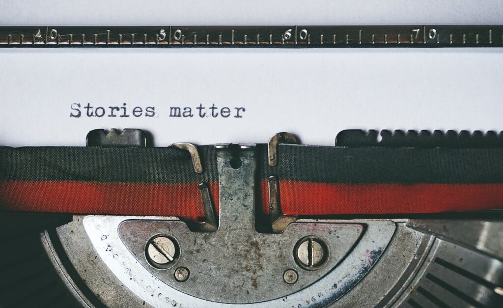 story creation is an important part of the branding process. A picture of a typewritter that has written stories matter on paper.