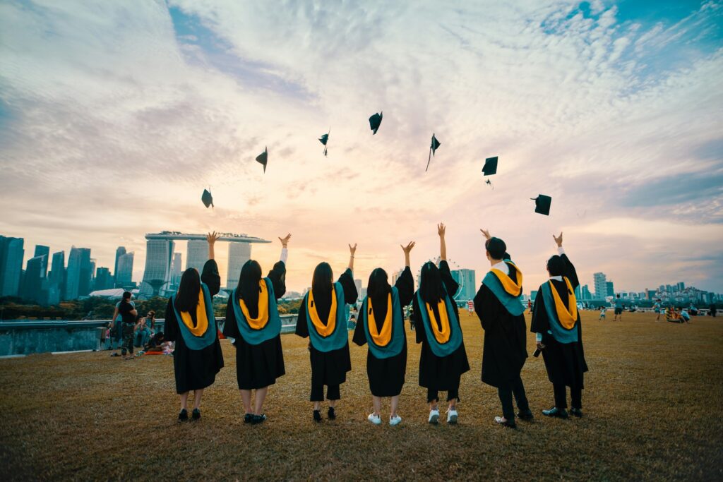 why web design school might not be the best option. A picture of graduates from university.
